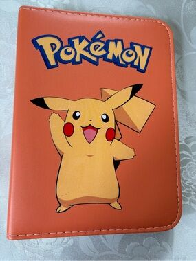 Pokémon 4 pocket Binder with 50 sleeves , wrist strap & zip closure Brand New